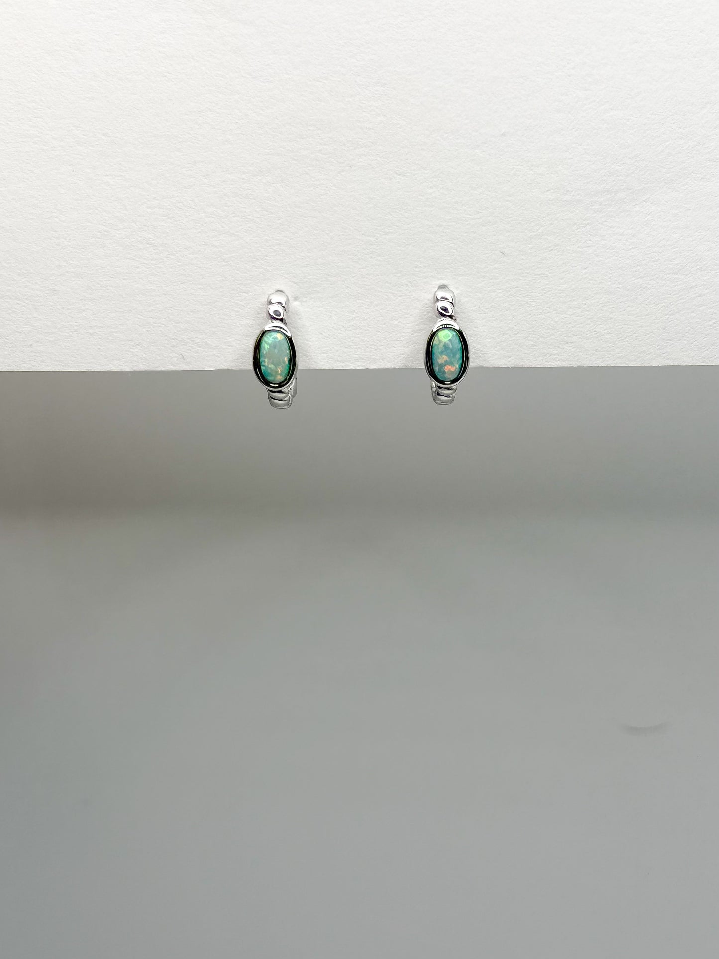 Single Oval Opal Twisted Design Hoop Earrings