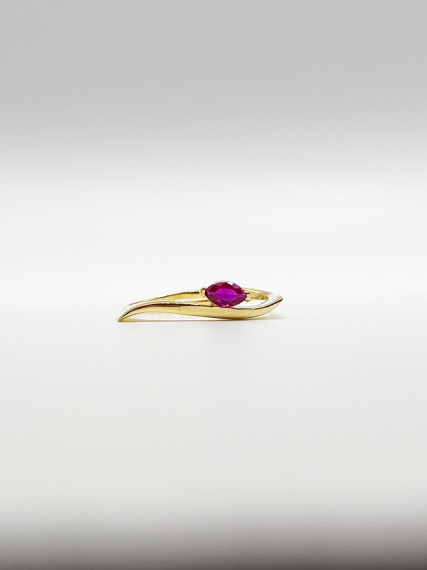 Flowy Shaped with Oval Center Stone Ring