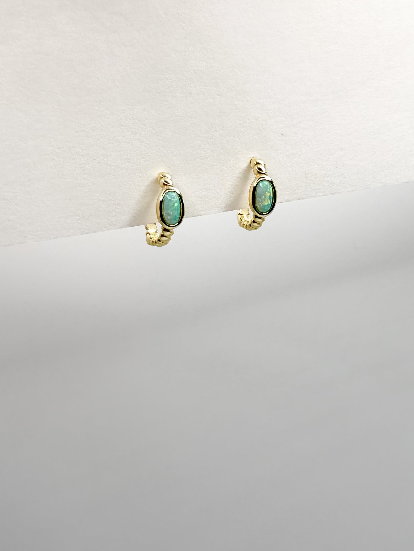 Single Oval Opal Twisted Design Hoop Earrings