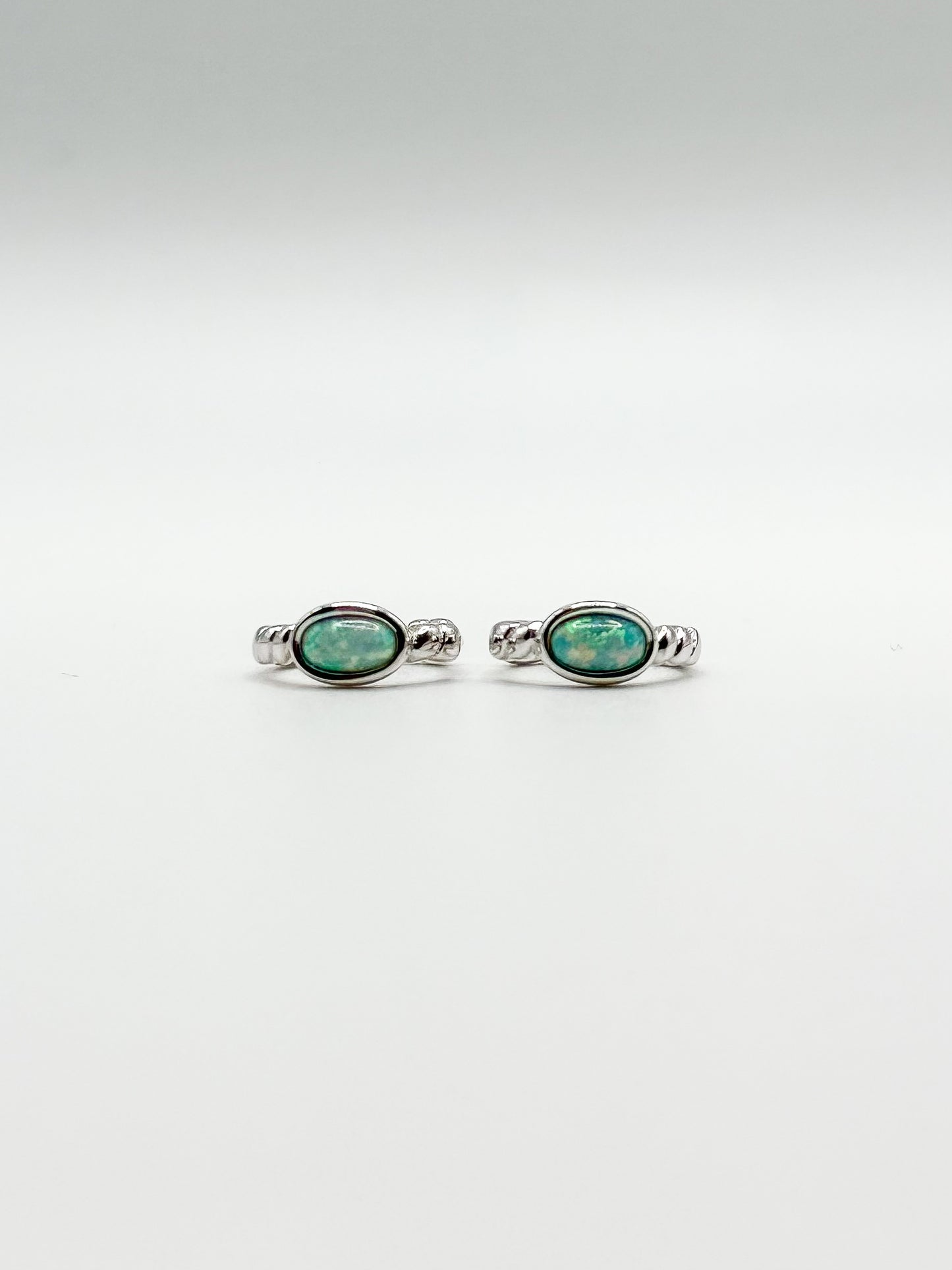 Single Oval Opal Twisted Design Hoop Earrings