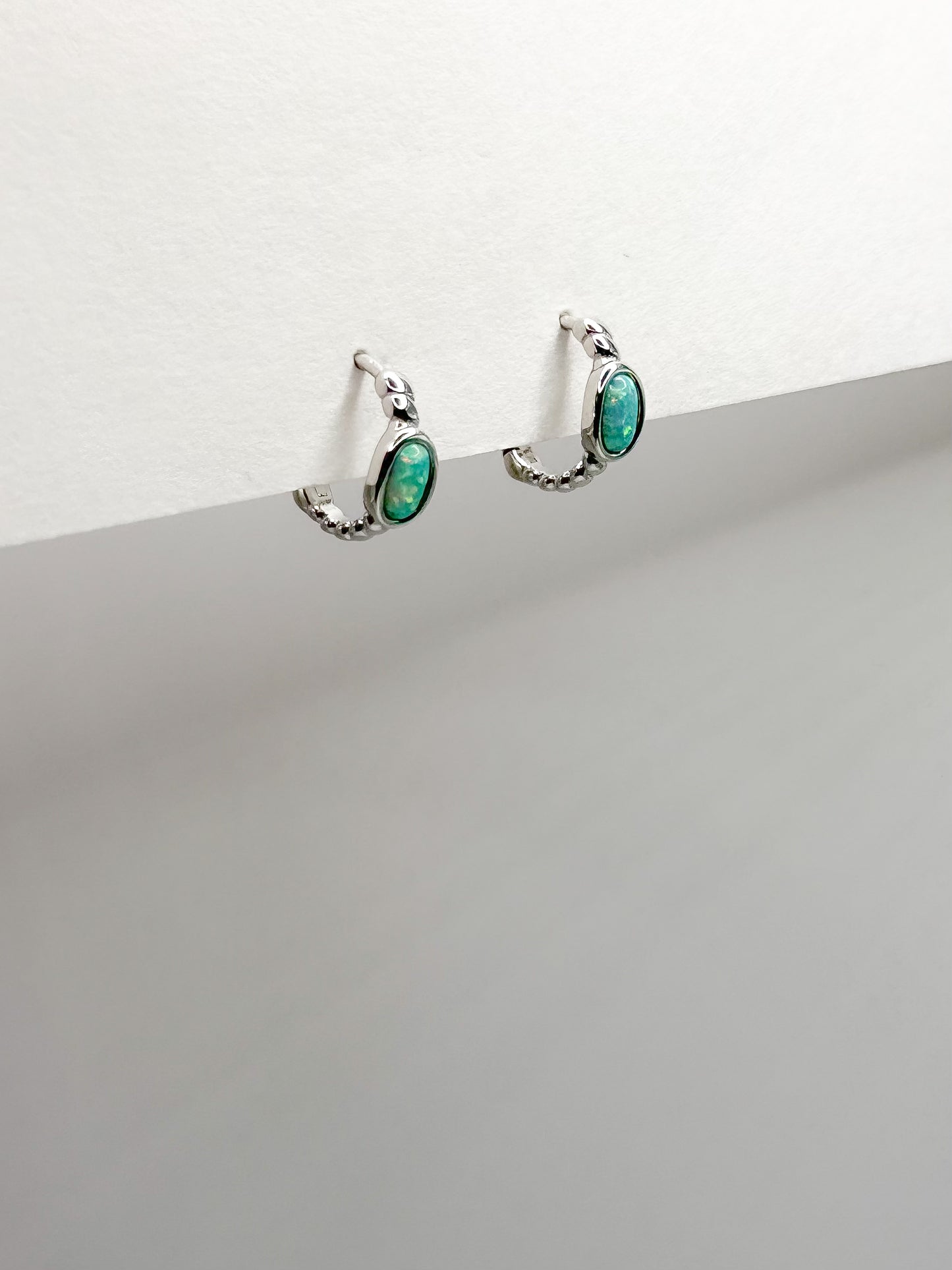 Single Oval Opal Twisted Design Hoop Earrings